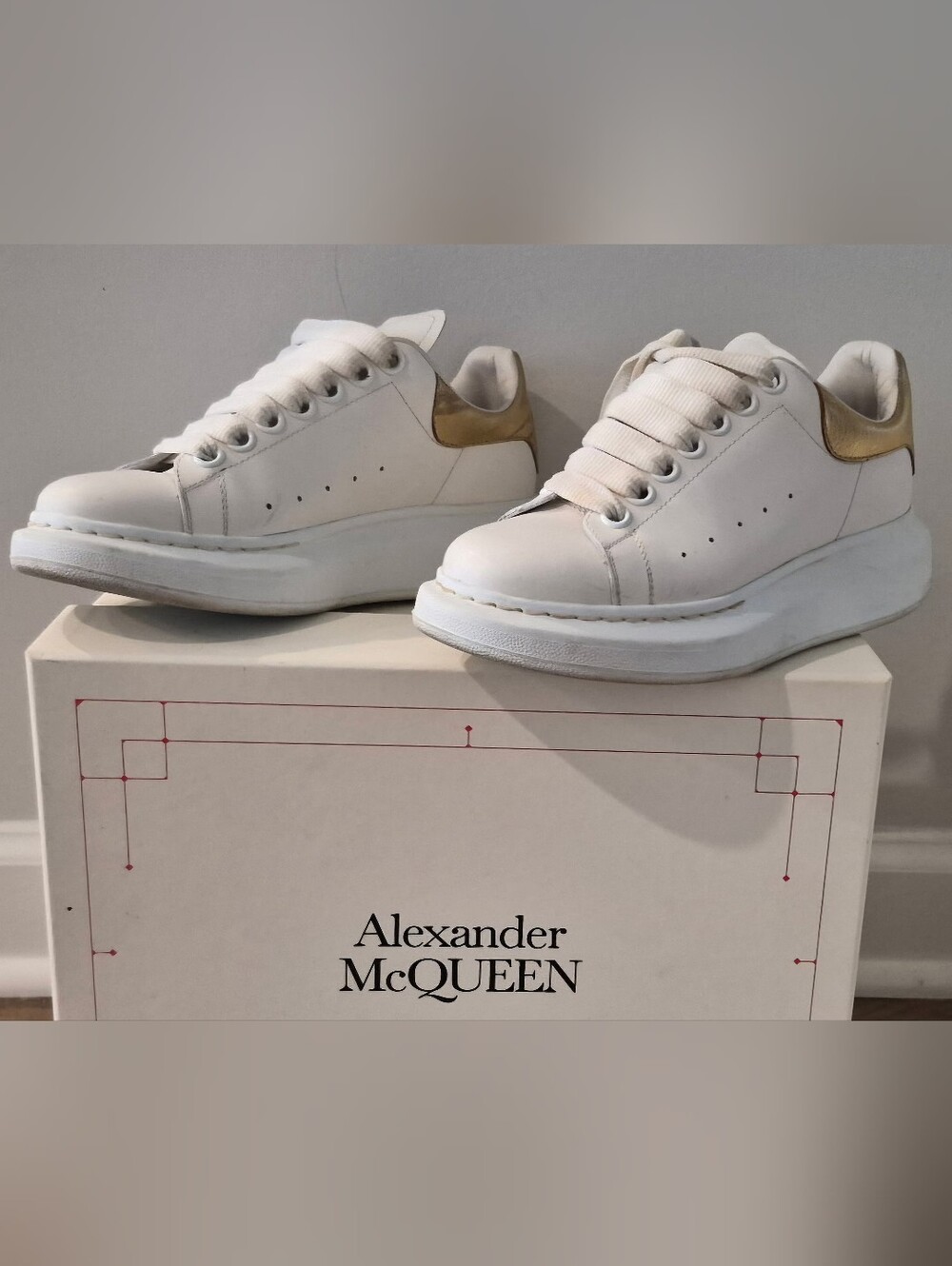 Alexander McQueen Oversized Sneaker in White with a Gold Heel